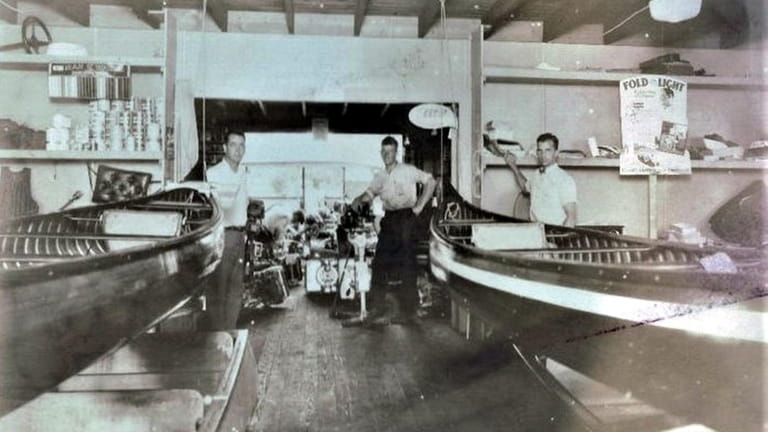 Alvah Goldsmith, right, in his boat shop in 1929. 
