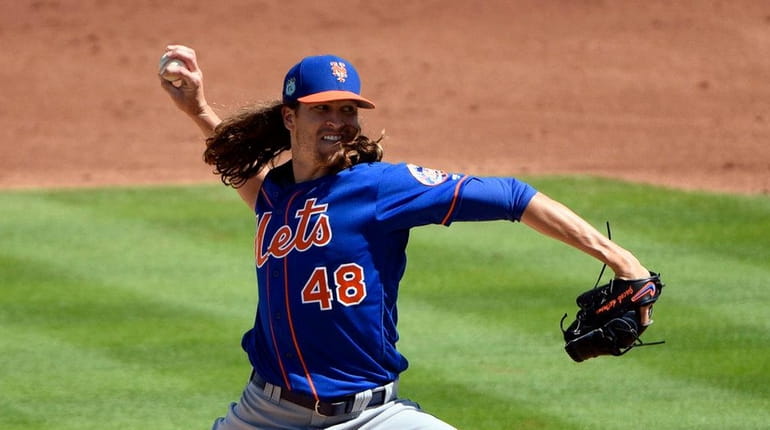 Jacob deGrom of the Mets pitches against the Astros during...