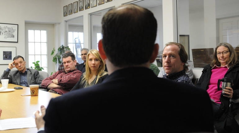 Congressman Lee Zeldin, talks to farmers about their concerns at...
