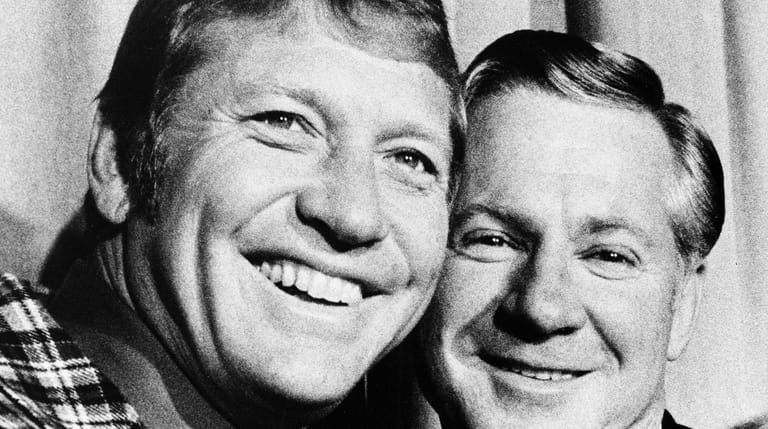 Mickey Mantle, left, and Whitey Ford pose together in New...