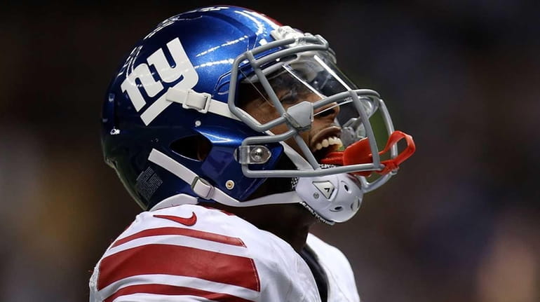Odell Beckham #13 of the New York Giants celebrates a...