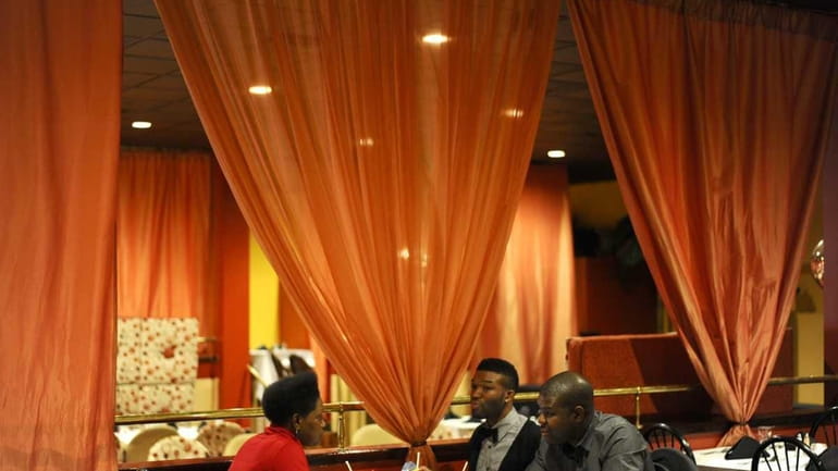 Patrons dine at Nakisaki, a Jamaican Chinese restaurant in Hempstead....
