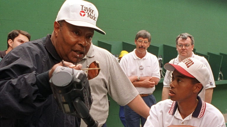 In this April 4, 1995, file photo, Amateur Tiger Woods,...