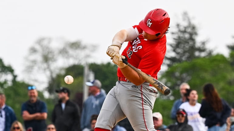 Max Rayburn of Center Moriches drives a single during a...