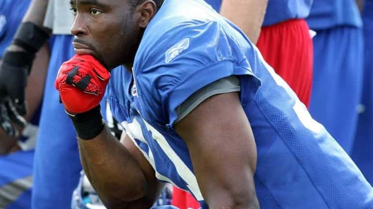 Justin Tuck takes a break at the Giants training camp....