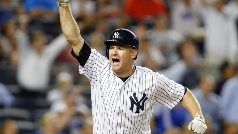 Chase Headley of the Yankees celebrates his walk-off home run...