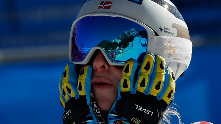 Norway's Ragnhild Mowinckel reacts after winning an alpine ski, women's...