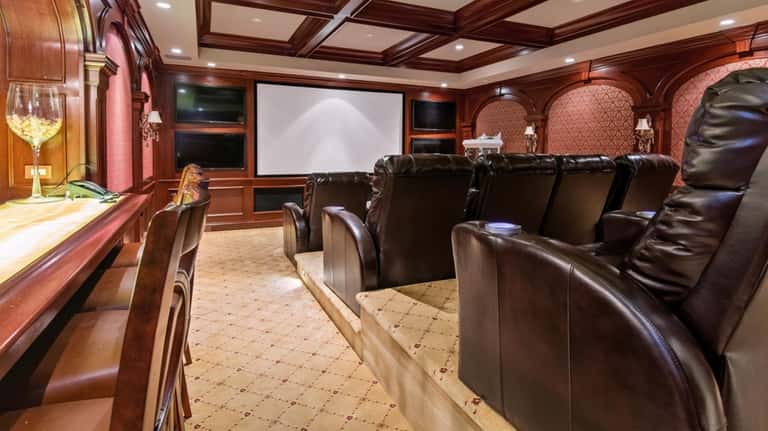 The 12-seat home theater and bar.