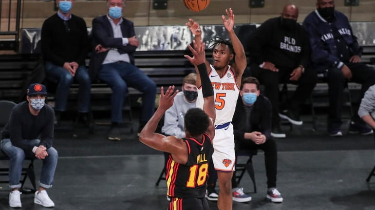 New York Knicks guard Immanuel Quickley (5) shoots against the...