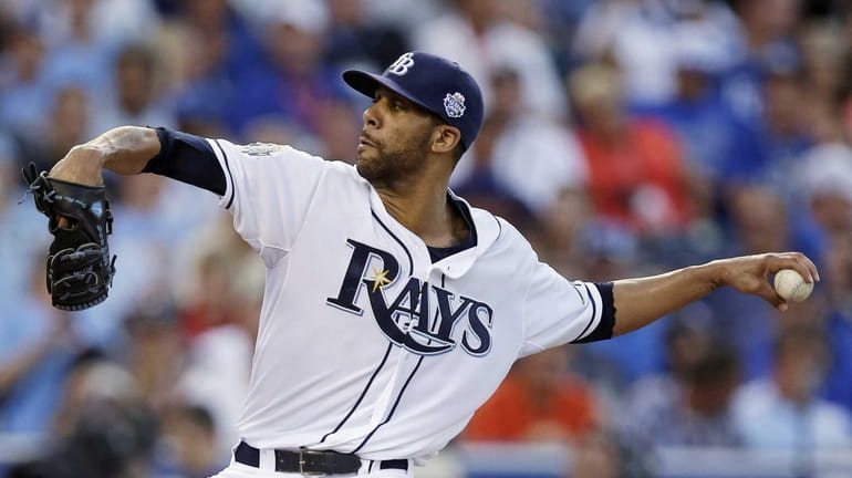 American League's David Price, of the Tampa Bay Rays, delivers...