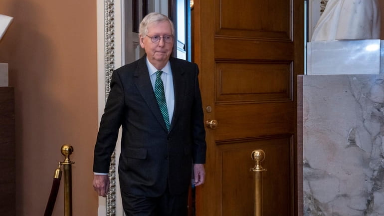Senate Minority Leader Mitch McConnell (R-Ky.) leaves a meeting with fellow...