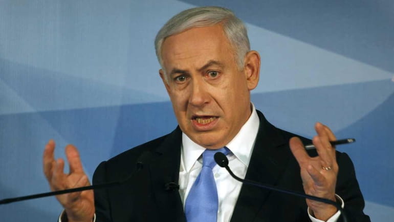 Israeli Prime Minister Benjamin Netanyahu gestures during a press conference...