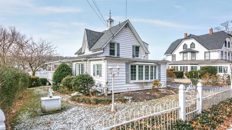 This 1860 Centerport home features waterfront views.