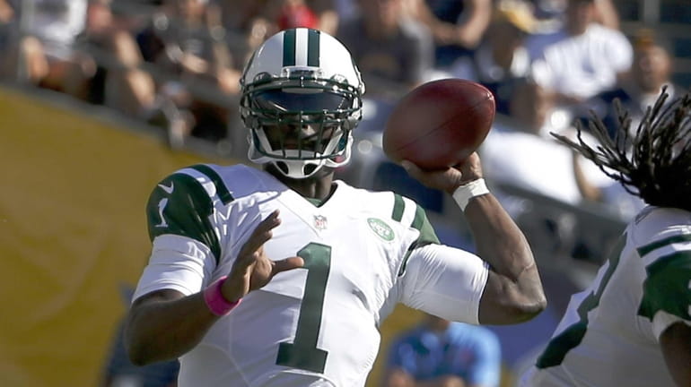 Jets quarterback Michael Vick throws against the San Diego Chargers...