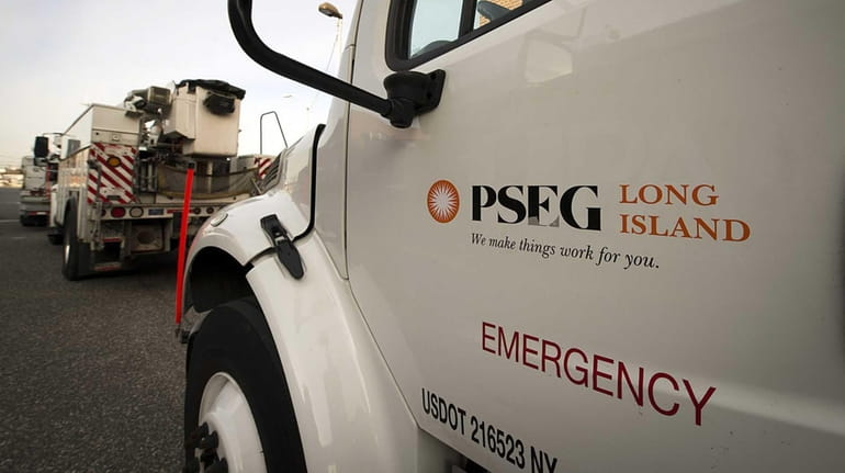 PSEG Long Island trucks leave a service yard on Jan....