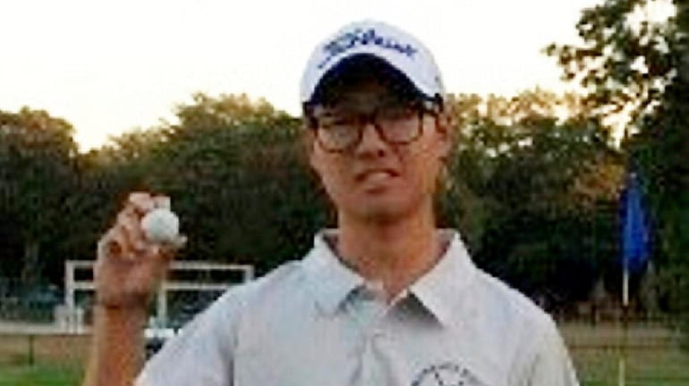 Timmy Na of the Sewahanka District boys golf team after...