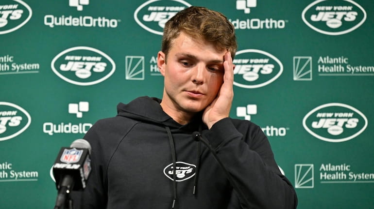 Jets quarterback Zach Wilson speaks during a news conference following...