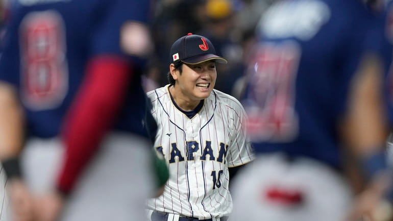 Japan player Shohei Ohtani (16) smiles during the player introduction...