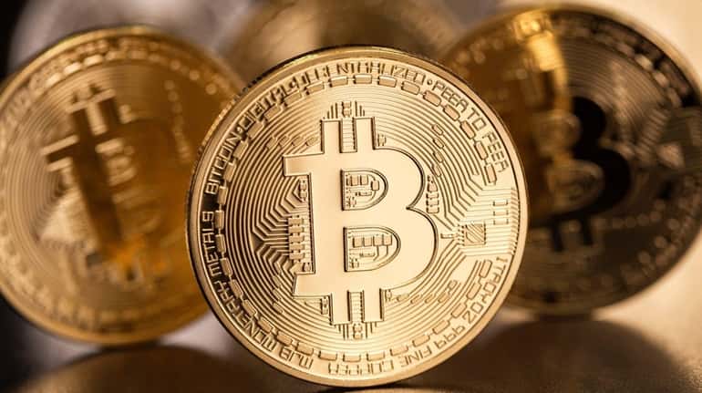 Bitcoin is a virtual currency  whose value has  soared  recently.