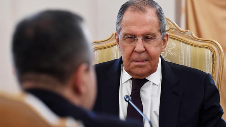Russian Foreign Minister Sergey Lavrov attends a meeting with his...