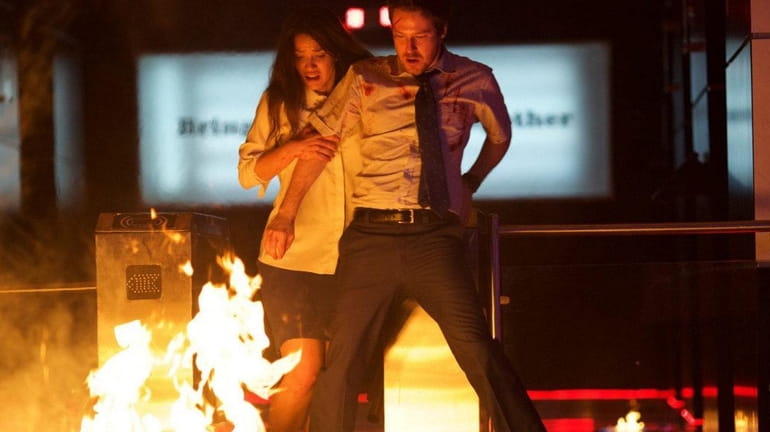 John Gallagher Jr. and Adria Arjona try to stay alive...