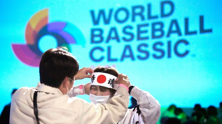 One of Japan fan prepares to cheer their them before...