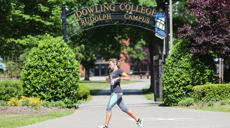 A runner passes Dowling College's Rudolph Campus in Oakdale on...