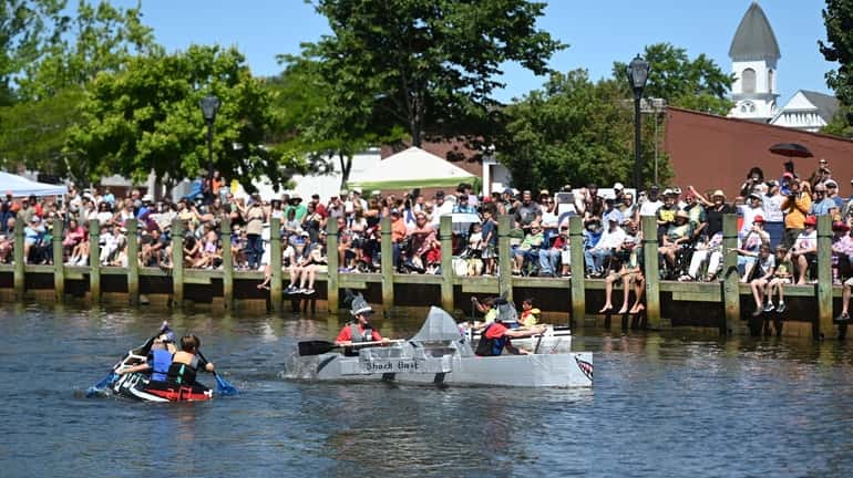 "Shark Bait" wins a heat during the Riverhead Cardboard Boat Race on...