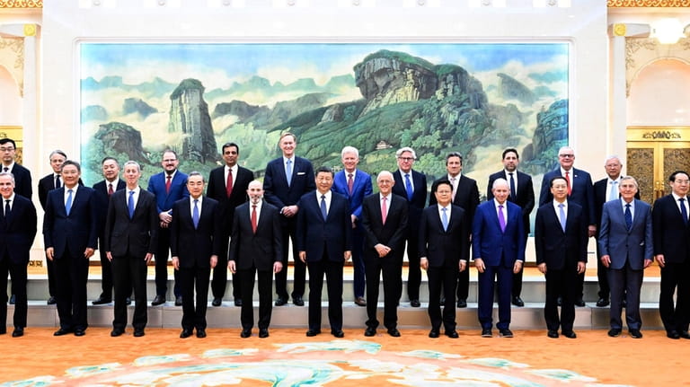 In this photo released by Xinhua News Agency, Chinese President...