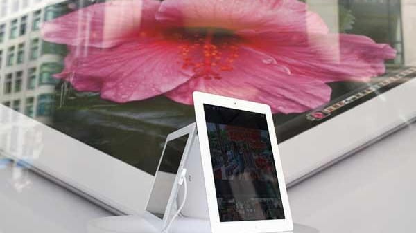 The new iPad is seen in a window display at...