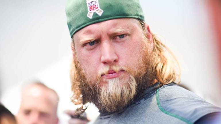 Jets center Nick Mangold reports for training camp at the...