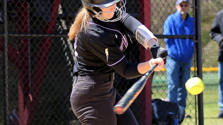 Sayville's Kate Meyer drives a two RBI double to the...