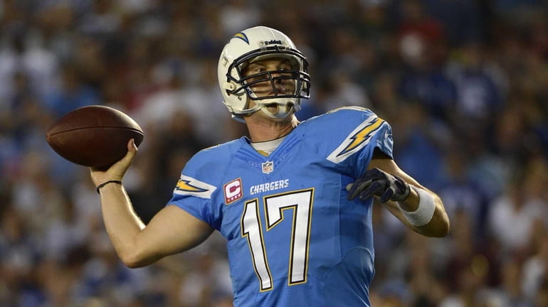 San Diego Chargers quarterback Philip Rivers throws the ball against...