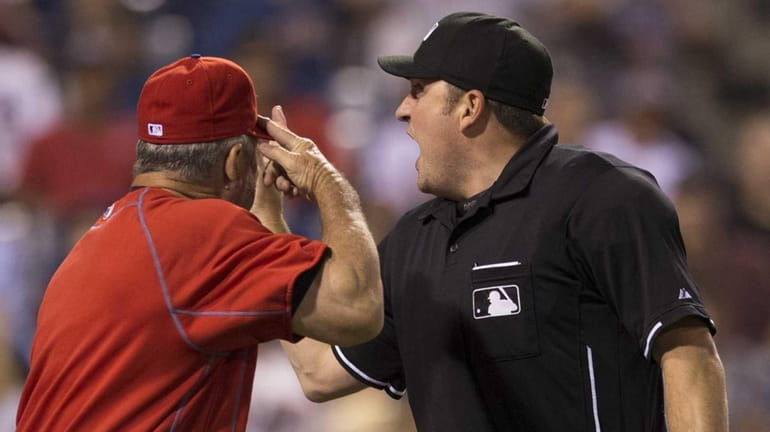 Phillies bench coach Larry Bowa gets ejected after arguing with...