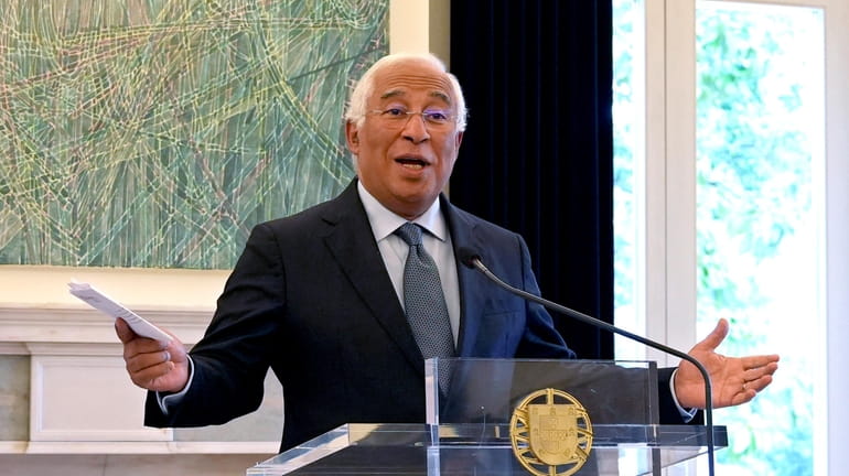 Portuguese Prime Minister Antonio Costa gestures during a news conference...