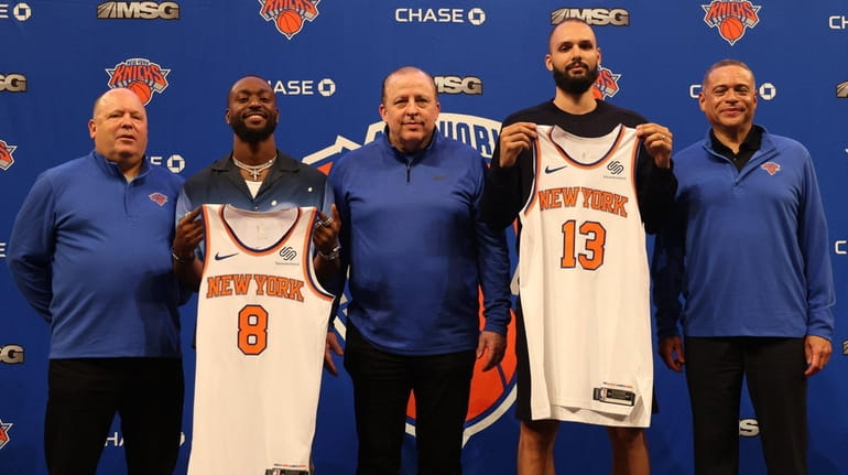 From left, Knicks president Leon Rose, Kemba Walker, coach Tom Thibodeau, Evan...