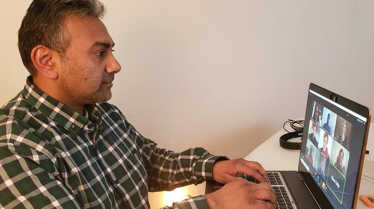 Vikram Rajan, co-founder of Kings Park-based phoneBlogger.net & Videosocials.net, works...