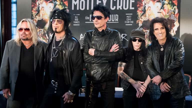 Vince Neil, Nikki Sixx, Tommy Lee and Mick Mars of...
