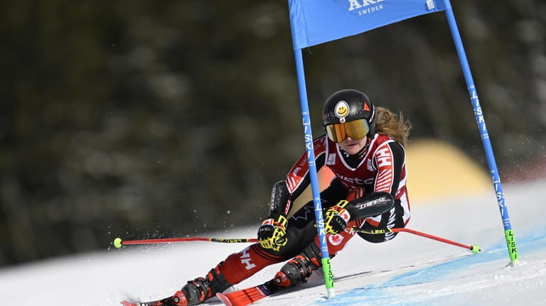 Canada's Valerie Grenier speeds down the course during an alpine...
