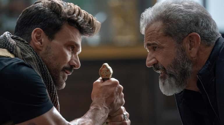 Frank Grillo (l) and Mel Gibson in Hulu's "Boss Level." 