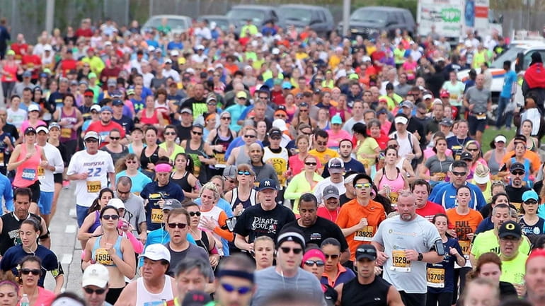 Participants start the Long Island Marathon on May 4, 2014,...