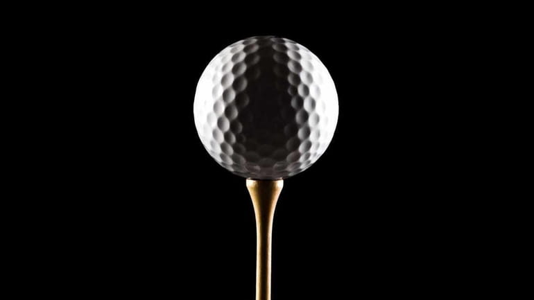 2009 -- Stock photo of a golf ball on a...