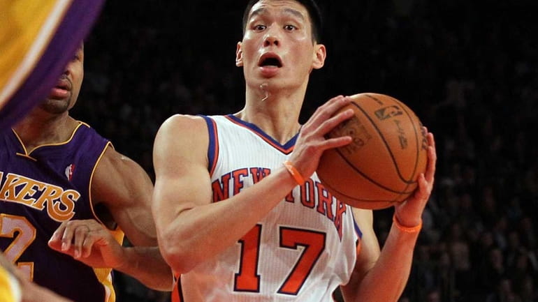 Jeremy Lin of the Knicks goes to the hoop against...