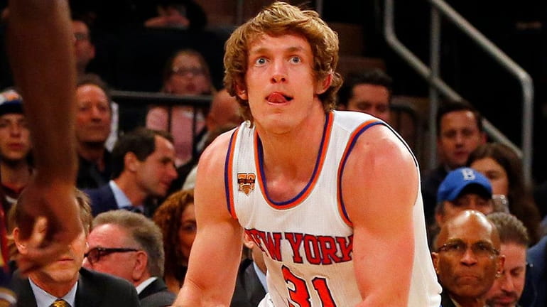 Ron Baker #31 of the New York Knicks controls the...