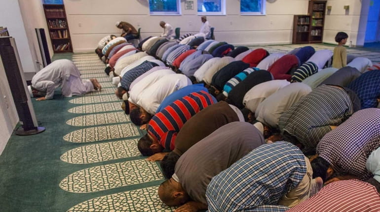 Ramadan observers gather at the Islamic Center of Long Island...