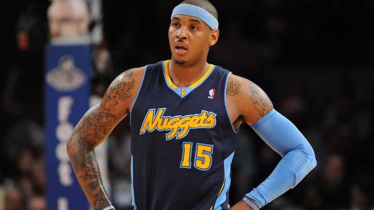 Denver Nuggets point forward Carmelo Anthony (15) waits for game...