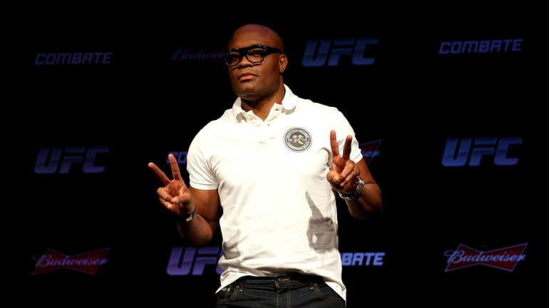 Former UFC middleweight champion Anderson Silva poses for photographers after...