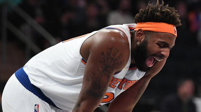 Knicks center Mitchell Robinson reacts in the first half of...