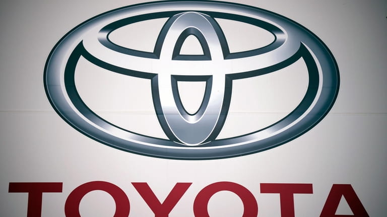 This photo shows a logo of Toyota Motor Corp. at...