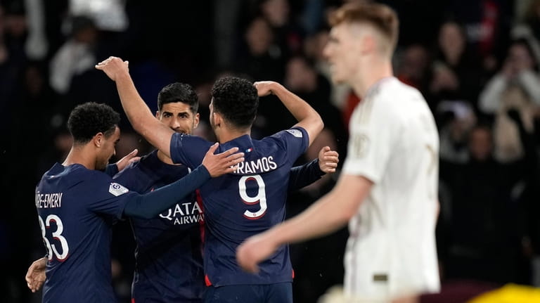 PSG's Goncalo Ramos, 2nd right, celebrates with teammates after scoring...